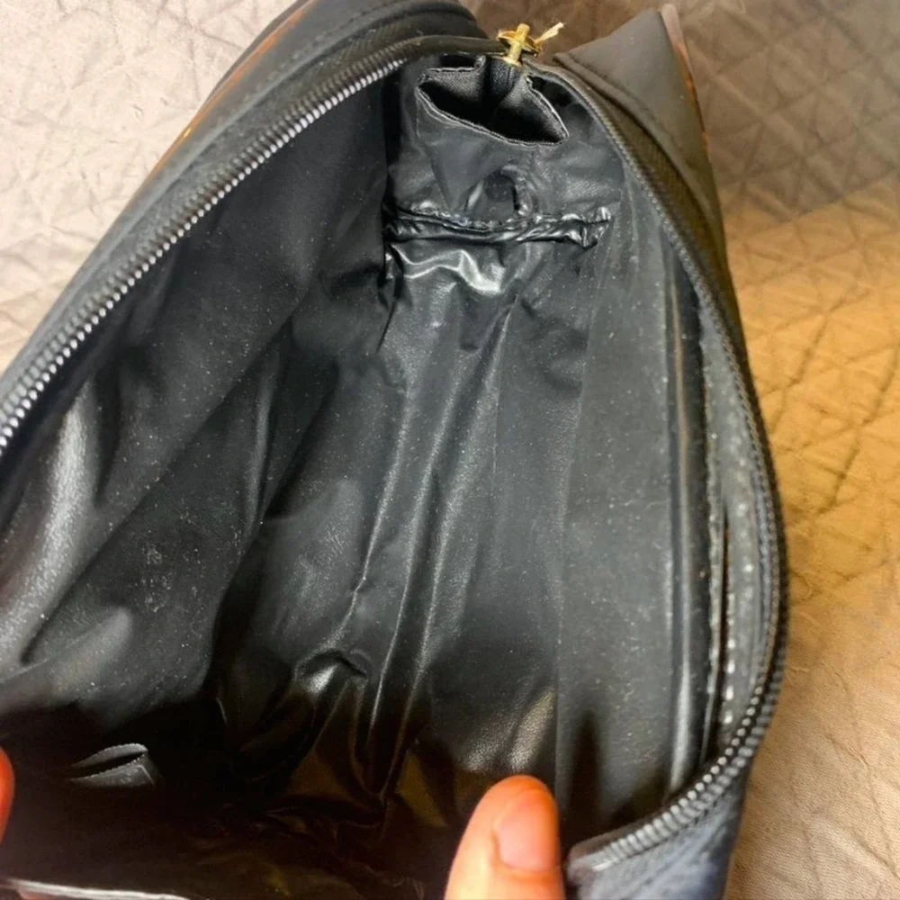 𝅺5/ $25 Cosmetic World black makeup bag with animal print